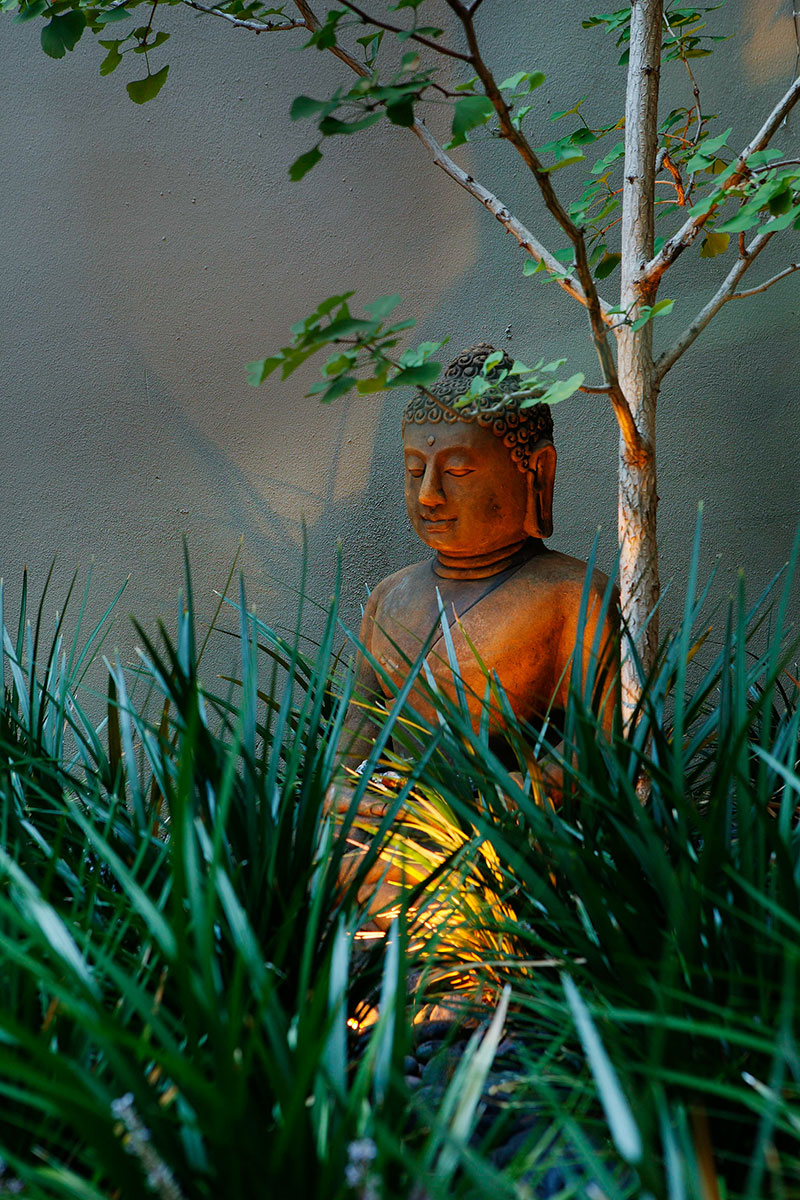 Garden Buddha statue in a beautiful garden
