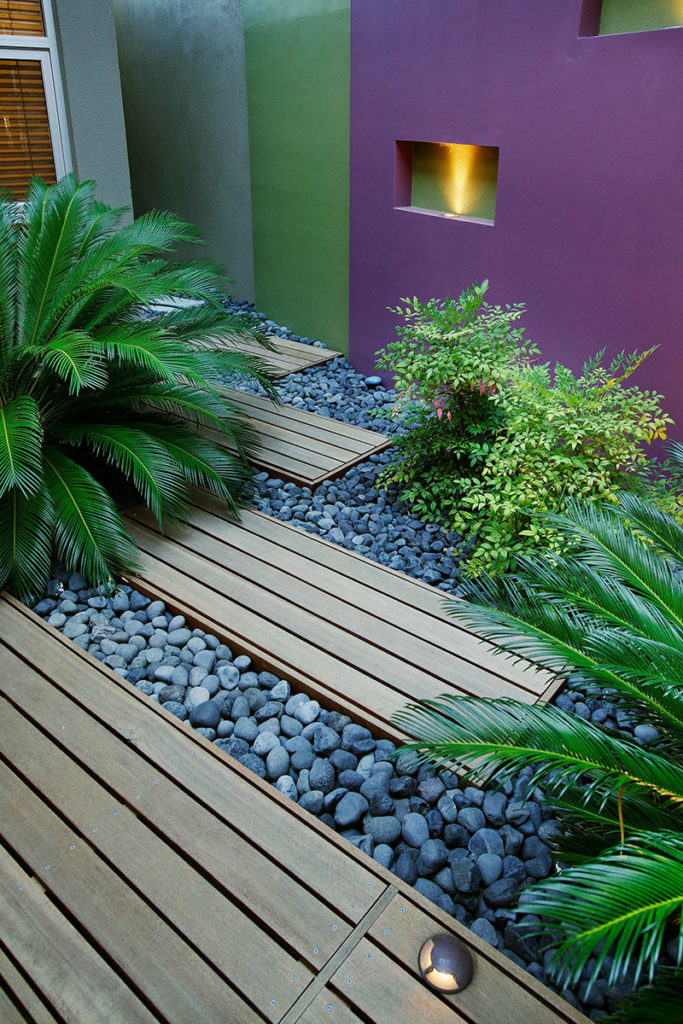 Subi Centro Courtyard design with decking and plants