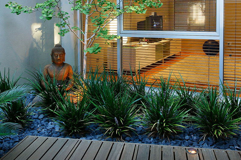 Garden Buddha statue in a beautiful garden